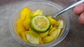 A bowl of healthy fresh fruit salad, made from sliced Ã¢â¬â¹Ã¢â¬â¹pineapple, mango and lime, top view Royalty Free Stock Photo